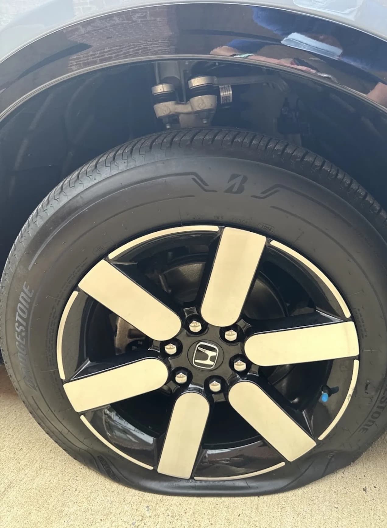 Wheel and tire close-up during a Spears Company service call